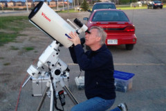 Dr-Burns-Sighting-a-telescope